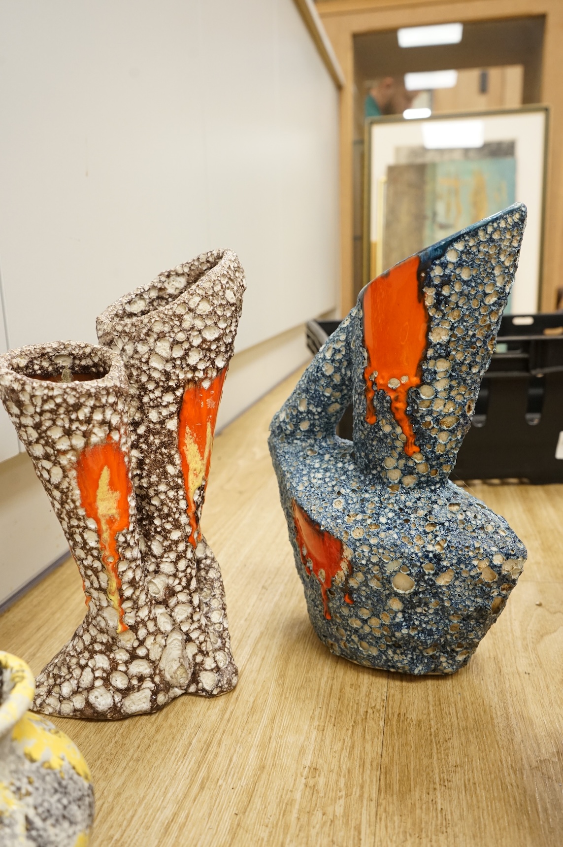 A collection of studio ceramics and pottery to include a Zsolnay vase and a Lyn Alves hexagonal dish